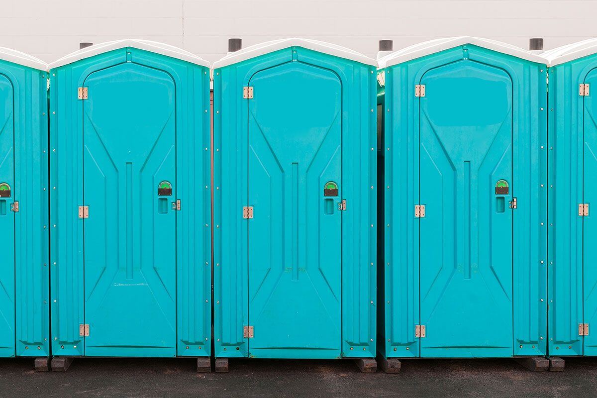 Industrial portable restroom units at a plant in Fall River, Massachusetts
